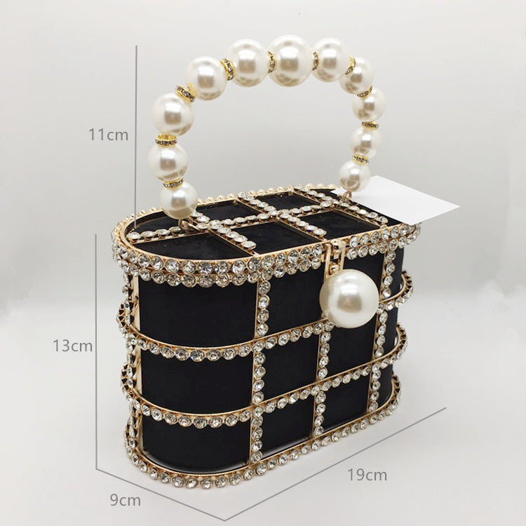Aviary Hollow Pearl Buckle Birdcage Clutch