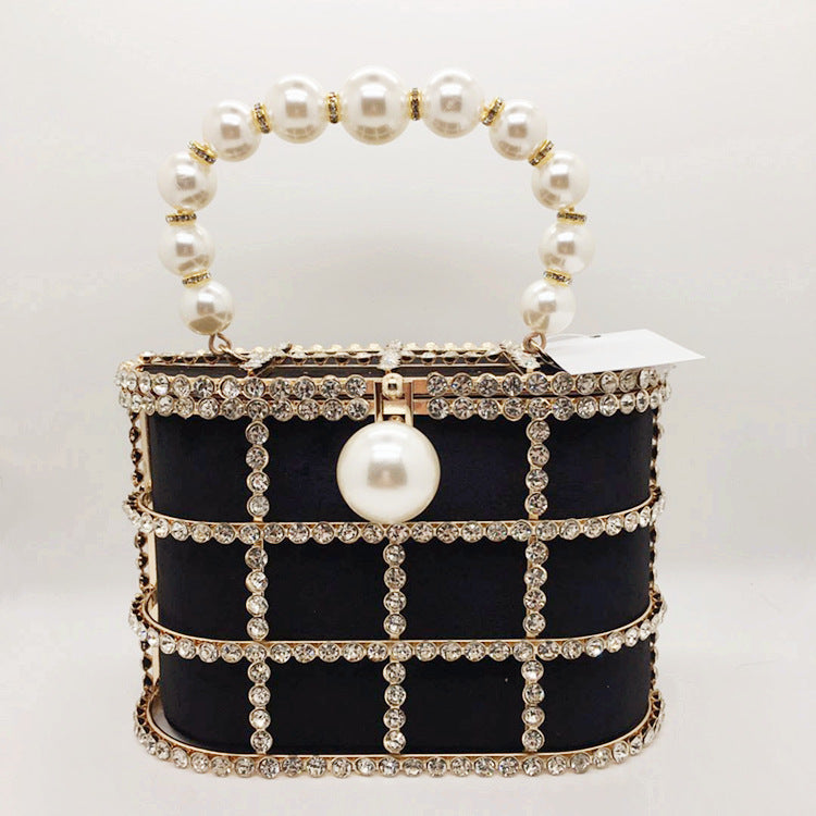 Aviary Hollow Pearl Buckle Birdcage Clutch