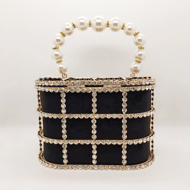 Aviary Hollow Pearl Buckle Birdcage Clutch