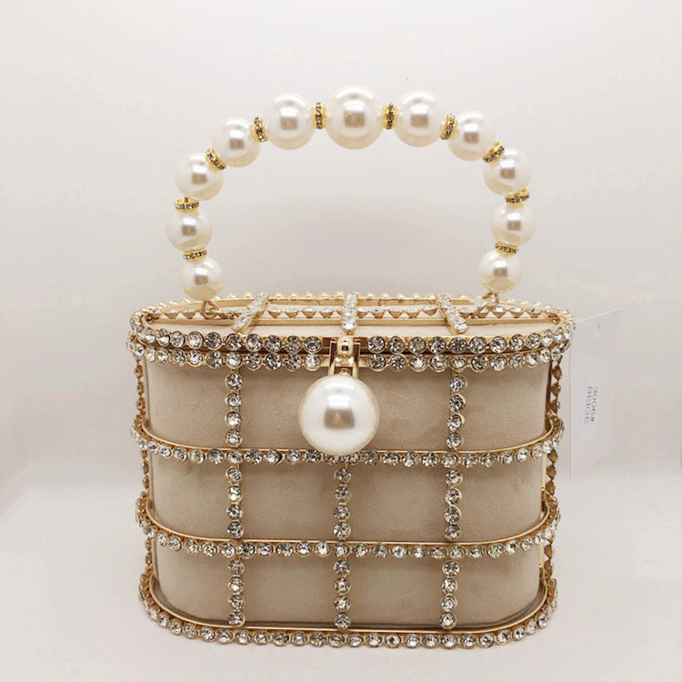 Aviary Hollow Pearl Buckle Birdcage Clutch